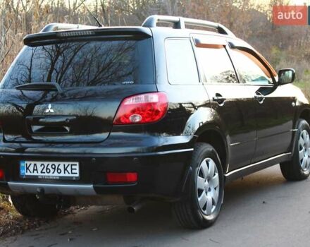 Черный Мицубиси Аутлендер, объемом двигателя 2 л и пробегом 189 тыс. км за 7200 $, фото 19 на Automoto.ua