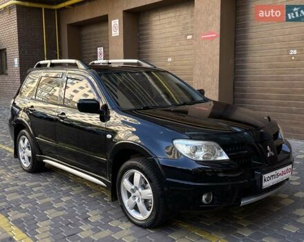 Черный Мицубиси Аутлендер, объемом двигателя 2 л и пробегом 270 тыс. км за 7199 $, фото 12 на Automoto.ua