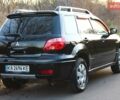 Черный Мицубиси Аутлендер, объемом двигателя 2 л и пробегом 189 тыс. км за 7200 $, фото 19 на Automoto.ua