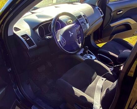 Черный Мицубиси Аутлендер, объемом двигателя 2.4 л и пробегом 217 тыс. км за 7300 $, фото 9 на Automoto.ua