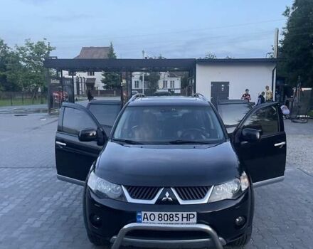 Черный Мицубиси Аутлендер, объемом двигателя 2.4 л и пробегом 290 тыс. км за 9500 $, фото 3 на Automoto.ua