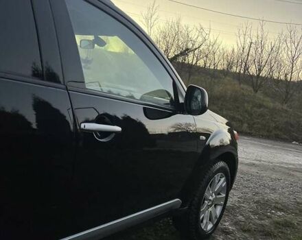 Черный Мицубиси Аутлендер, объемом двигателя 2.2 л и пробегом 310 тыс. км за 9700 $, фото 6 на Automoto.ua