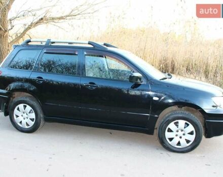 Черный Мицубиси Аутлендер, объемом двигателя 2 л и пробегом 189 тыс. км за 7200 $, фото 35 на Automoto.ua