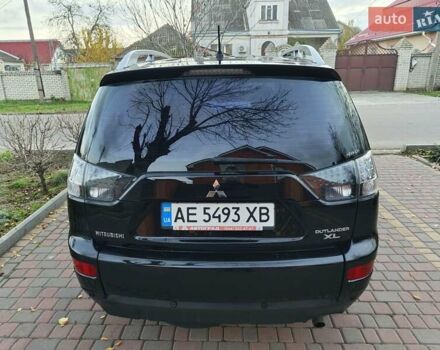 Черный Мицубиси Аутлендер, объемом двигателя 2.36 л и пробегом 192 тыс. км за 8800 $, фото 3 на Automoto.ua