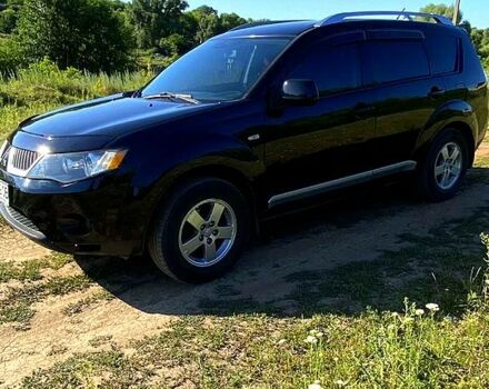 Черный Мицубиси Аутлендер, объемом двигателя 2.4 л и пробегом 217 тыс. км за 7300 $, фото 7 на Automoto.ua