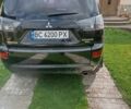 Черный Мицубиси Аутлендер, объемом двигателя 2.35 л и пробегом 245 тыс. км за 8000 $, фото 20 на Automoto.ua