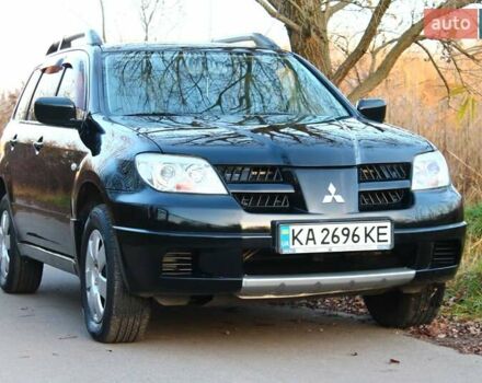 Черный Мицубиси Аутлендер, объемом двигателя 2 л и пробегом 189 тыс. км за 7200 $, фото 21 на Automoto.ua