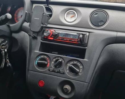 Черный Мицубиси Аутлендер, объемом двигателя 2 л и пробегом 212 тыс. км за 7900 $, фото 5 на Automoto.ua