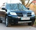 Черный Мицубиси Аутлендер, объемом двигателя 2 л и пробегом 189 тыс. км за 7200 $, фото 21 на Automoto.ua