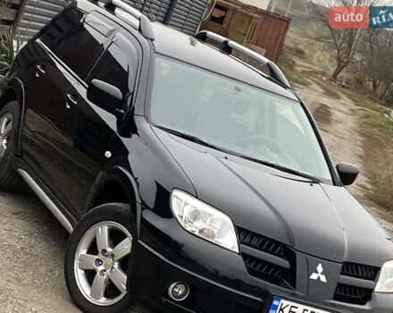 Черный Мицубиси Аутлендер, объемом двигателя 2.4 л и пробегом 178 тыс. км за 6900 $, фото 7 на Automoto.ua