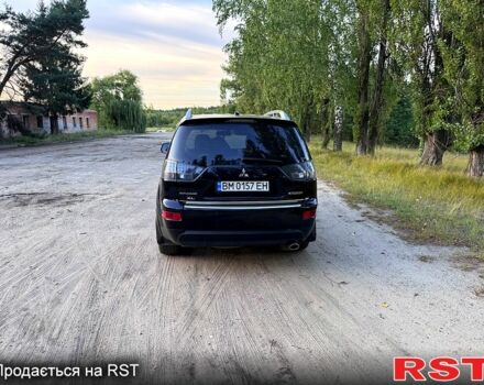 Черный Мицубиси Аутлендер, объемом двигателя 2.4 л и пробегом 208 тыс. км за 10200 $, фото 5 на Automoto.ua