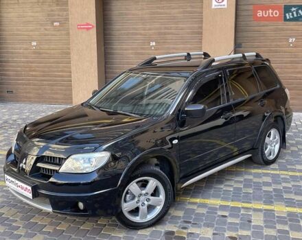 Черный Мицубиси Аутлендер, объемом двигателя 2 л и пробегом 270 тыс. км за 7199 $, фото 4 на Automoto.ua