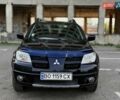 Черный Мицубиси Аутлендер, объемом двигателя 2 л и пробегом 174 тыс. км за 6399 $, фото 9 на Automoto.ua
