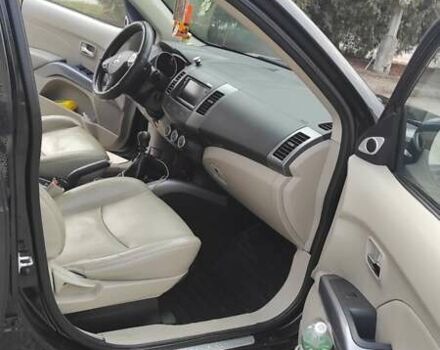 Чорний Міцубісі Аутлендер, об'ємом двигуна 2.2 л та пробігом 275 тис. км за 9900 $, фото 8 на Automoto.ua