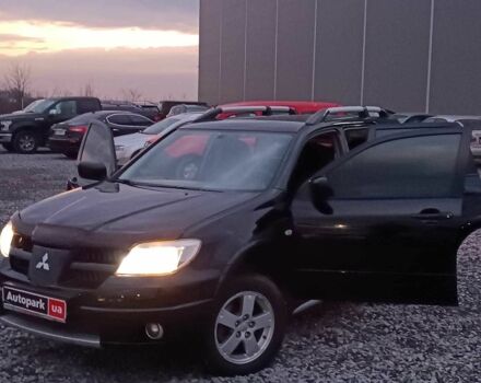 Черный Мицубиси Аутлендер, объемом двигателя 2 л и пробегом 271 тыс. км за 6940 $, фото 23 на Automoto.ua