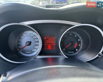 Черный Мицубиси Аутлендер, объемом двигателя 2.36 л и пробегом 286 тыс. км за 9200 $, фото 12 на Automoto.ua