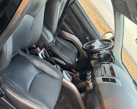 Чорний Міцубісі Аутлендер, об'ємом двигуна 3 л та пробігом 236 тис. км за 9800 $, фото 6 на Automoto.ua