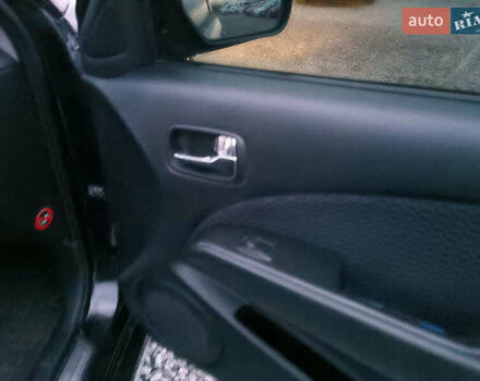 Чорний Міцубісі Аутлендер, об'ємом двигуна 2 л та пробігом 271 тис. км за 6940 $, фото 21 на Automoto.ua