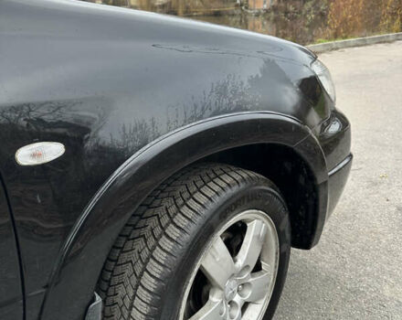 Чорний Міцубісі Аутлендер, об'ємом двигуна 2 л та пробігом 118 тис. км за 8100 $, фото 8 на Automoto.ua