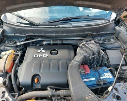 Черный Мицубиси Аутлендер, объемом двигателя 2 л и пробегом 249 тыс. км за 8750 $, фото 13 на Automoto.ua