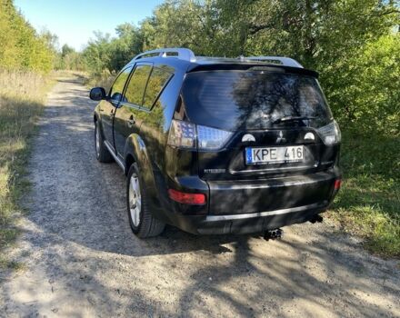 Чорний Міцубісі Аутлендер, об'ємом двигуна 2 л та пробігом 350 тис. км за 4100 $, фото 5 на Automoto.ua