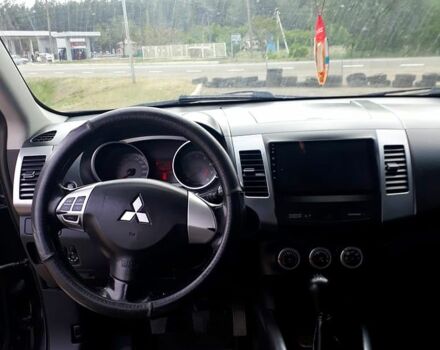 Черный Мицубиси Аутлендер, объемом двигателя 2.4 л и пробегом 180 тыс. км за 8900 $, фото 4 на Automoto.ua