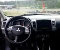 Черный Мицубиси Аутлендер, объемом двигателя 2.4 л и пробегом 180 тыс. км за 8900 $, фото 4 на Automoto.ua