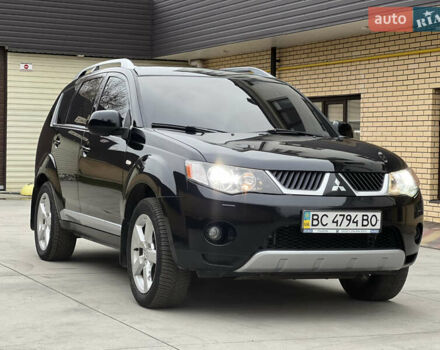 Чорний Міцубісі Аутлендер, об'ємом двигуна 2.4 л та пробігом 221 тис. км за 8900 $, фото 2 на Automoto.ua