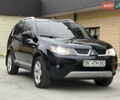 Чорний Міцубісі Аутлендер, об'ємом двигуна 2.4 л та пробігом 221 тис. км за 8900 $, фото 2 на Automoto.ua