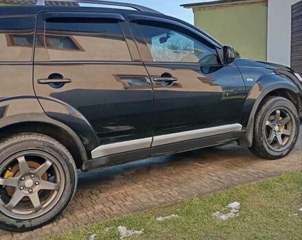 Черный Мицубиси Аутлендер, объемом двигателя 2.35 л и пробегом 245 тыс. км за 8000 $, фото 3 на Automoto.ua