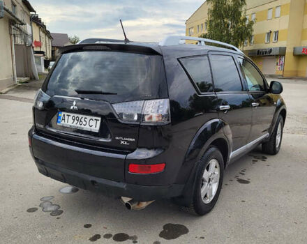 Чорний Міцубісі Аутлендер, об'ємом двигуна 2.4 л та пробігом 205 тис. км за 8400 $, фото 17 на Automoto.ua