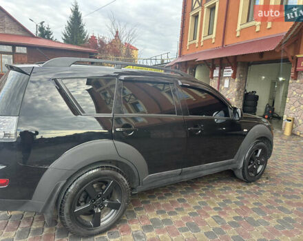 Черный Мицубиси Аутлендер, объемом двигателя 2.4 л и пробегом 199 тыс. км за 8777 $, фото 4 на Automoto.ua