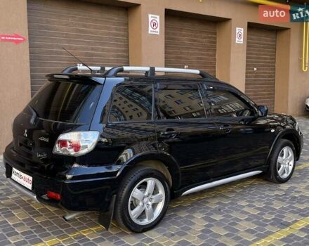 Черный Мицубиси Аутлендер, объемом двигателя 2 л и пробегом 270 тыс. км за 7199 $, фото 11 на Automoto.ua