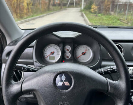 Чорний Міцубісі Аутлендер, об'ємом двигуна 2 л та пробігом 118 тис. км за 8100 $, фото 29 на Automoto.ua