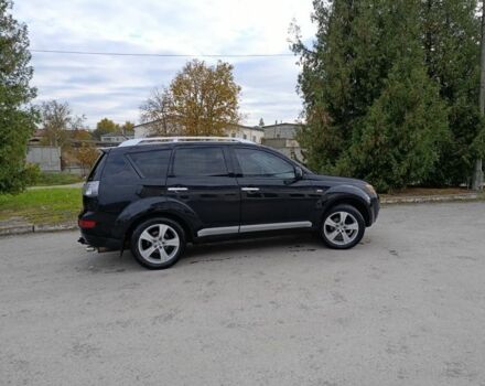 Черный Мицубиси Аутлендер, объемом двигателя 2.2 л и пробегом 200 тыс. км за 9500 $, фото 4 на Automoto.ua
