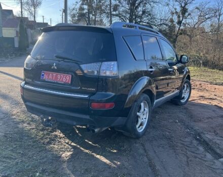 Черный Мицубиси Аутлендер, объемом двигателя 2 л и пробегом 247 тыс. км за 4600 $, фото 11 на Automoto.ua
