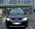 Черный Мицубиси Аутлендер, объемом двигателя 0 л и пробегом 207 тыс. км за 9500 $, фото 1 на Automoto.ua