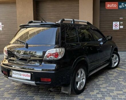 Черный Мицубиси Аутлендер, объемом двигателя 2 л и пробегом 270 тыс. км за 7199 $, фото 16 на Automoto.ua