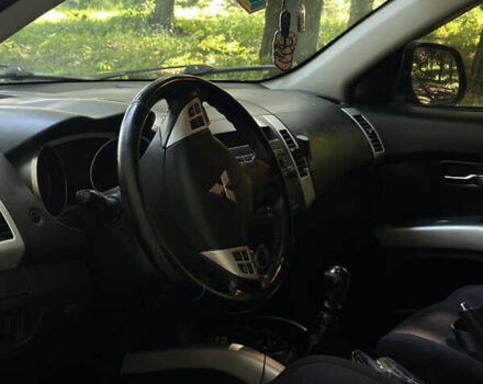 Черный Мицубиси Аутлендер, объемом двигателя 1.97 л и пробегом 265 тыс. км за 9600 $, фото 11 на Automoto.ua