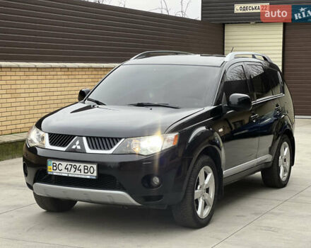 Чорний Міцубісі Аутлендер, об'ємом двигуна 2.4 л та пробігом 221 тис. км за 8900 $, фото 1 на Automoto.ua