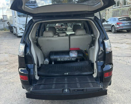 Черный Мицубиси Аутлендер, объемом двигателя 2.36 л и пробегом 286 тыс. км за 9200 $, фото 7 на Automoto.ua