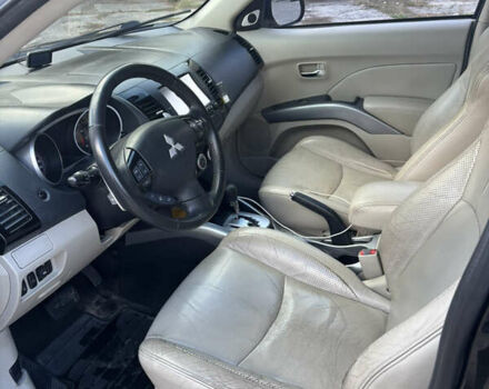 Черный Мицубиси Аутлендер, объемом двигателя 2.36 л и пробегом 286 тыс. км за 9200 $, фото 9 на Automoto.ua