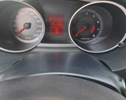 Черный Мицубиси Аутлендер, объемом двигателя 2.36 л и пробегом 245 тыс. км за 9200 $, фото 4 на Automoto.ua