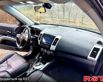 Черный Мицубиси Аутлендер, объемом двигателя 2.4 л и пробегом 229 тыс. км за 9790 $, фото 12 на Automoto.ua