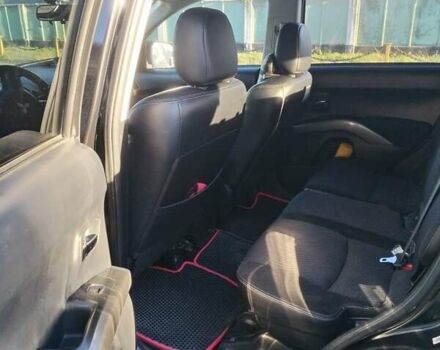 Черный Мицубиси Аутлендер, объемом двигателя 2.4 л и пробегом 199 тыс. км за 9000 $, фото 4 на Automoto.ua