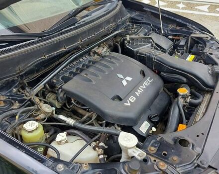 Чорний Міцубісі Аутлендер, об'ємом двигуна 3 л та пробігом 143 тис. км за 9500 $, фото 11 на Automoto.ua