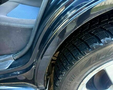 Черный Мицубиси Аутлендер, объемом двигателя 2.4 л и пробегом 231 тыс. км за 8500 $, фото 7 на Automoto.ua