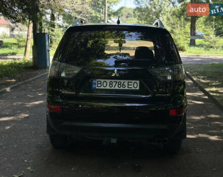 Черный Мицубиси Аутлендер, объемом двигателя 1.97 л и пробегом 265 тыс. км за 9600 $, фото 9 на Automoto.ua