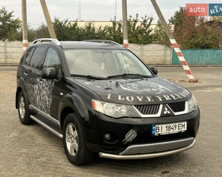 Мицубиси Аутлендер 2008 в Кременчуге на Automoto.ua Черный Мицубиси Аутлендер, объемом двигателя 2.4 л и пробегом 230 тыс. км за 6850 $, фото 22 на Automoto.ua