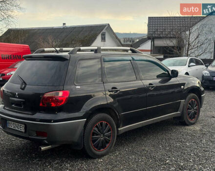 Черный Мицубиси Аутлендер, объемом двигателя 2 л и пробегом 240 тыс. км за 5500 $, фото 6 на Automoto.ua